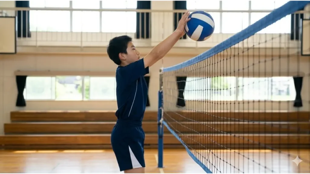 背が低い選手がワンタッチを取るためにネットから少し離れた位置でジャンプするバレーボールのブロック戦略